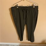 Lululemon  On The Fly 23* Crop Pants in Dark Olive Photo 3