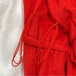 Trina Turk  Marianela Jumpsuit Wrap Wide Leg Sleeveless Jersey Coral Size 12 Photo 8