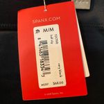 Spanx  half slip in black. NWT. #10179R tummy control panel. 1 small and 1 medium Photo 6