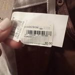 Top Shop Jeans that are a brown and off white color size women’s 28! Photo 2