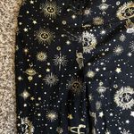 No Boundaries Hippie Black & Gold Yoga Pants Photo 1