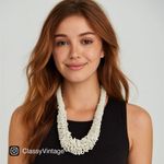 Boutique Boho white layered ruffed seed bead statement necklace. Photo 0