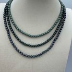 Boutique Three strand faux pearl layered necklace. Adjustable and easy. Photo 0