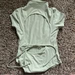 Love j  mock neck open back bodysuit size medium Photo 3
