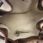 Dooney & Bourke Vintage  Leather Drawstring Bucket Bag in Bone color Brown Trim a Photo 8