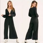 Free People black silky Larina jumpsuit pleated wide leg women’s size 2 Photo 2