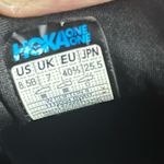 Hoka  One One women’s Black and white Athletic Shoes Photo 2