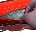 Badgley Mischka zip around red wallet with several compartments Photo 7