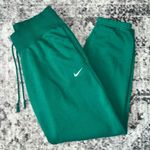 Nike  Women's Phoenix Fleece Oversized Pant in Malachite/Sail Photo 0