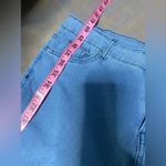 None Lightweight Women’s blue jeans, flared leg with tie details, size large Photo 10