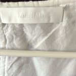 Like New Merlette Brandt Eyelet Tiered
Swing Blouse White Medium Retail $500.00 Photo 9