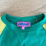 Edikted  - Brooklyn Babe Long Sleeve Crop Graphic Tee in Green and Yellow Photo 1
