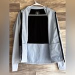 ASICS WOMEN'S THERMOSTORM FULL ZIP JACKET Photo 8