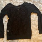 Miami Style Savannah, Georgia long sleeve with lace back. Photo 1