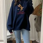 Levi's 725 High-Rise Bootcut Jeans Photo 0