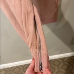 Free People movement dusty rose colored joggers with ankle zip and drawstring Photo 2