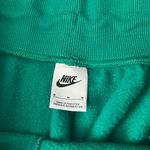 Nike  Women's Phoenix Fleece Oversized Pant in Malachite/Sail Photo 4