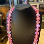 Mermaid glass necklace. These are very rare. This is pink iridescent. Beautiful. Photo 3
