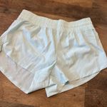 DICK'S Sporting Goods Light teal running shorts  Photo 0