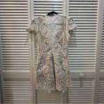 Intermix  white deep neck plunge lace detail romper in size‎ small Photo 1
