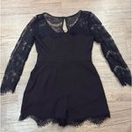 Cupcakes and Cashmere Long sleeve lace romper Photo 3