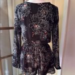 ASTR  Black and White Floral Romper with Bell Sleeves Photo 7