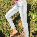 Uniqlo  Black Distressed Skinny Jeans Photo 1