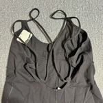 Free People. Movement Glow One Piece Activewear in Black Size L Photo 4