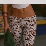 Indah  Brown and White Patterned Flare Pants Photo 1