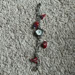 Lexington women’s vintage silver/red hat charm bracelet watch measurements shown Silver Photo 0