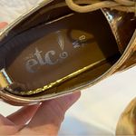 Rue 21 junior gold metallic lace up shoes size 7/8 Photo 3