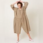 Black crane oversized puff jumpsuit in light clay color Photo 2