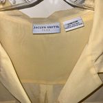 Jaclyn Smith  Light Yellow Blouse Photo 1