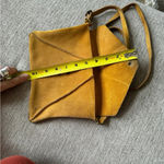 Free People  genuine suede leather envelope style bag adjustable strap yellow Photo 12