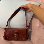 vintage wilson’s leather red y2k shoulder bag with buckle detail Photo 0