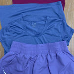 Champion Women's Short Sleeve Tees - Pink and Blue and purple shorts. Photo 0