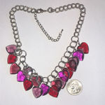 Silver Tone Heart Charm Statement Necklace with Red and Pink Accents Photo 1