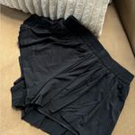 None Elegant Black Pleated Shorts Photo 0