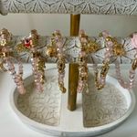 Elegant Pink and Gold Charm Bracelets Photo 2