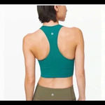 Lululemon ebb to train sports bra in the color laguna. In size 6 Photo 2