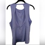 Nike Pro Essential Swoosh Tank
Color Light purple and Black size medium Photo 1