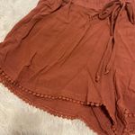 Macy's NWT Pom Pom shorts. Size Medium. Orange. Photo 1