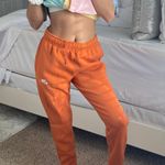 Nike Orange Swoosh Sweatpants Photo 0