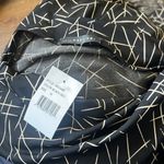 West Kei black and tan geo sleeveless high neck leg slit midi dress | 1X Photo 4