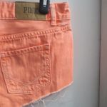 PINK Victoria's Secret denim jean cut off distress shorts in hot pink/orange size 2. Photo 5