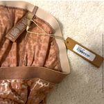 SKIMS Logo Velvet Collection Set in SIENNA Photo 7