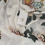 Fantastic Fawn  size large ivory self tie floral
Blouse v-neck button front NWT Photo 6