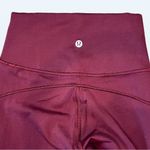Lululemon (Like New) In Movement Tight 25" *Everlux in Garnet, Size 2 Photo 4
