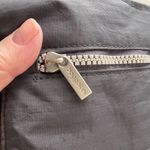 Baggallini  grey crossbody bag.  Many pockets Photo 7