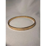 Vintage gold toned ridged quiet luxury thin bracelet Photo 1